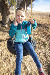 K12CNPPS-HO-T-SPORT-HOLZ-Girl Playing On Tire Swing